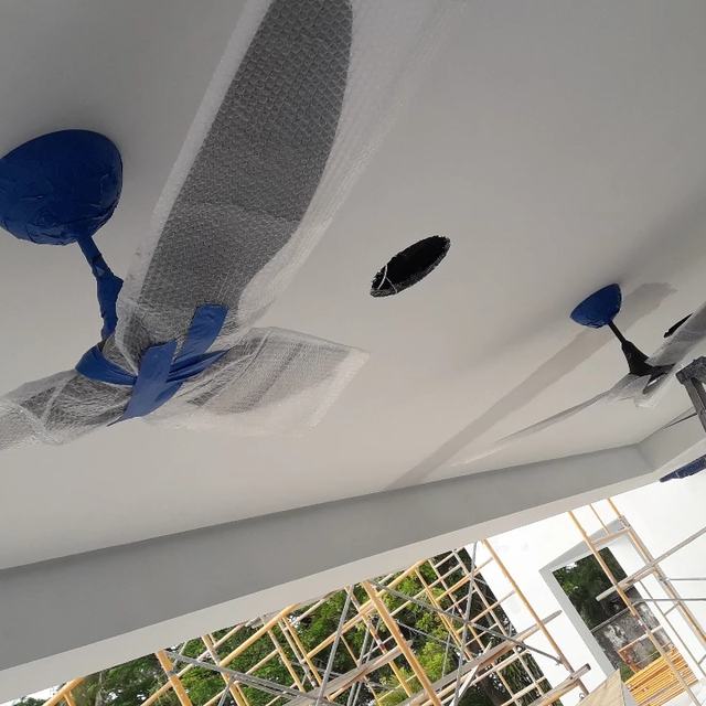 Ceiling fan installation in progress